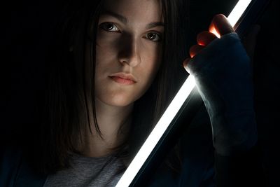 a woman holding a sword